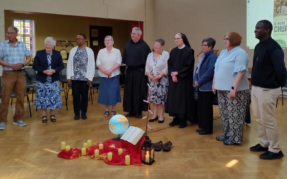 Outgoing and incoming members of the Vocations Ireland executive board are  celebrated during the group's annual conference in May, held in Dublin. (Julie A. Ferraro)