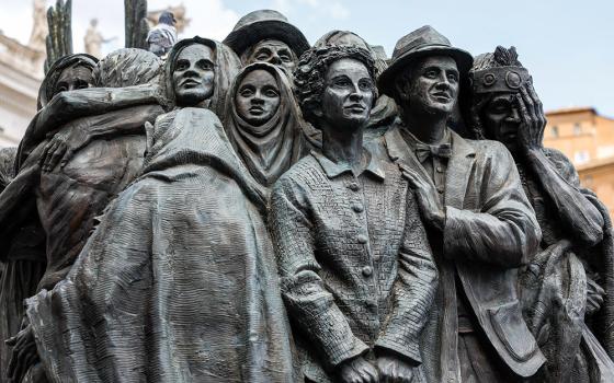 A detail is seen of "Angels Unawares," a sculpture by Canadian Timothy Schmalz in St. Peter's Square at the Vatican, June 3, 2024. The sculpture depicts a boat with 140 figures of migrants from various historical periods and various nations. (CNS/Lola Gomez)