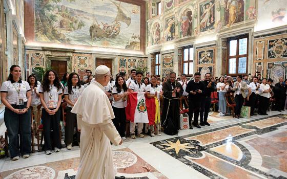 Pope Leo XIV meets with a group of young people from Peru at the Vatican July 28, 2025, as the Jubilee of Youth kicks off in Rome. (CNS photo/Vatican Media)
