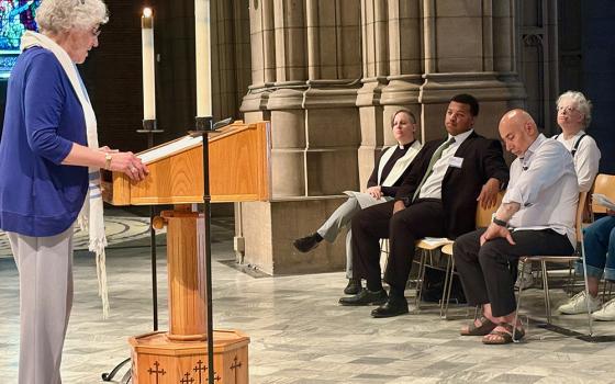 Rabbi Enid Lader of Beth Israel-the West Temple addresses the Cleveland interfaith prayer in solidarity with migrants on June 24. (Christine Schenk)