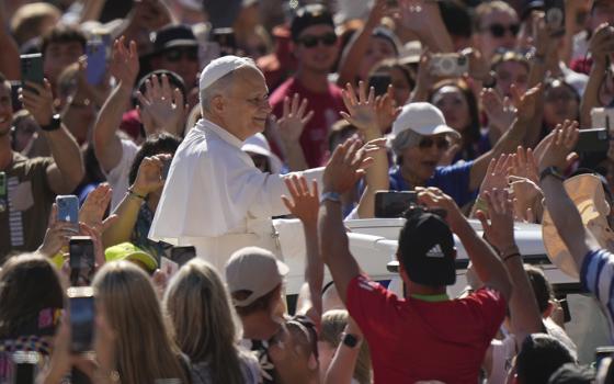 Pope Leo XIV holds his weekly general audience in St. Peter's Square, at the Vatican July 30, 2025. (AP Photo/Andrew Medichini)