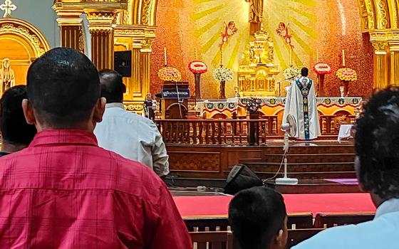 A priest celebrates Mass facing the altar in St. Mary's Church, Alangad, one of the oldest churches of the Ernakulam-Angamaly Archdiocese in the southwestern Indian state of Kerala. (Thomas Scaria)
