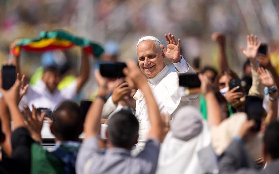 Pope Leo XIV waves to the crowd from the popemobile as he departs after celebrating a Mass concluding the Jubilee of Youth in Rome’s Tor Vergata neighborhood Aug. 3, 2025. (CNS/Lola Gomez)