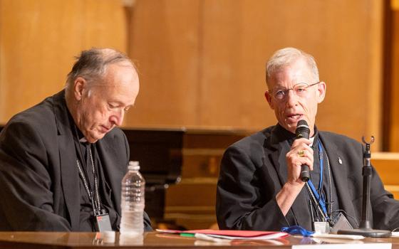 Archbishop John Wester of Santa Fe, N.M., speaks during a peace gathering in Hiroshima, Japan, Aug. 5, 2025, the eve of the 80th anniversary of the United States dropping the atomic bomb on Hiroshima. At left is Cardinal Robert McElroy of Washington. (OSV News/Catholic Standard/Mihoko Owada)