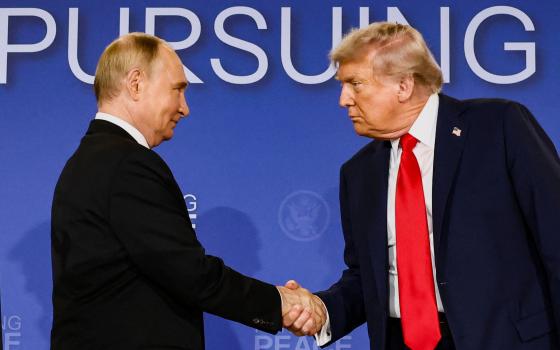 U.S. President Donald Trump and Russian President Vladimir Putin shake hands during a press conference following their meeting to negotiate an end to the war in Ukraine, at Joint Base Elmendorf-Richardson, in Anchorage, Alaska, Aug. 15, 2025. (OSV News photo/Kevin Lamarque, Reuters)