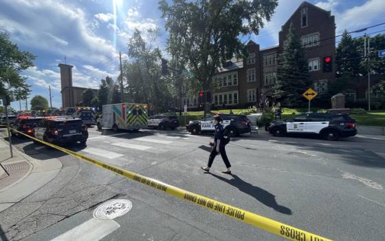 First responders block off the crime scene following a mass shooting at Annunciation Catholic School in Minneapolis Aug. 27, 2025. The Richfield Police Department is reporting there are up to 20 victims; two children and the suspected gunman are dead. (OSV News/The Catholic Spirit/Dave Hrbacek)
