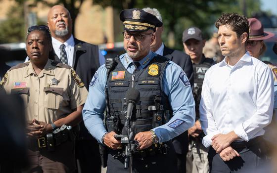 Minneapolis Police Chief Brian O'Hara, alongside Mayor Jacob Frey, right, addresses the media outside Annunciation Catholic School following a shooting Aug. 27, 2025. A shooter opened fire with a rifle through the windows of the school church and struck children celebrating Mass during the first week of school, killing two and wounding 17 people in an act of violence the police chief called “absolutely incomprehensible.” (OSV News/The Catholic Spirit/Dave Hrbacek)