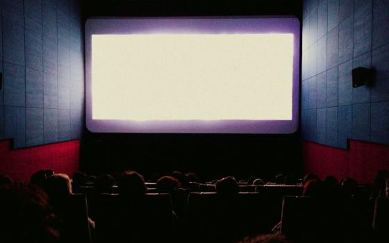 blank movie screen in empty theater