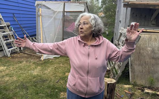 Gloria Simeon, co-founder of the Mother Kuskokwim Tribal Coalition, speaks during an interview outside her smokehouse in Bethel, Alaska, on June 18, 2025. (AP/Mark Thiessen)