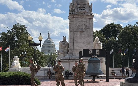 National Guard troops walk on Columbus Circle plaza in front of Union Station on Aug. 25, 2025. (NCR photo/James V. Grimaldi)