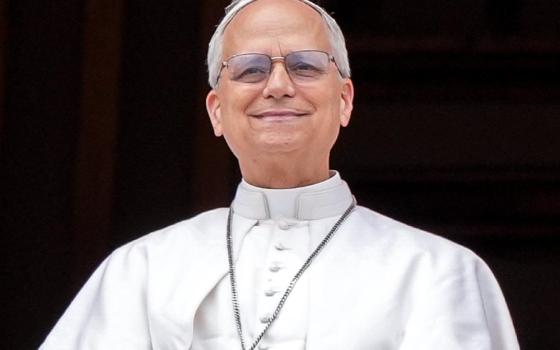 Pope Leo XIV looks out to the crowd from the central balcony of St. Peter’s Basilica at the Vatican as he leads the midday recitation of the “Regina Coeli” prayer for the first time May 11, 2025. (CNS/Lola Gomez)