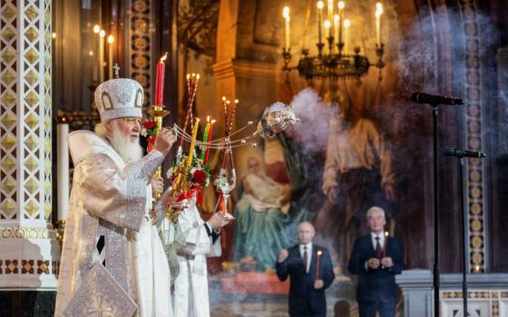 Russian Orthodox Church Patriarch Kirill, left, leads the Orthodox Easter service as Russian President Vladimir Putin, left, and Moscow Mayor Sergei Sobyanin stand nearby at Christ the Saviour Cathedral in Moscow, Russia, April 20. (Russian Orthodox Church Press Service via AP, file/Oleg Varov)