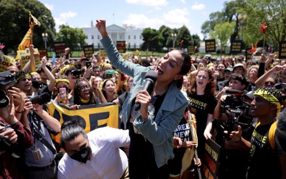 U.S. Rep. Alexandria Ocasio-Cortez, Democrat of N.Y., participates in a "No Climate, No Deal" demonstration outside the White House in Washington June 28, 2021. (CNS/Reuters/Evelyn Hockstein)