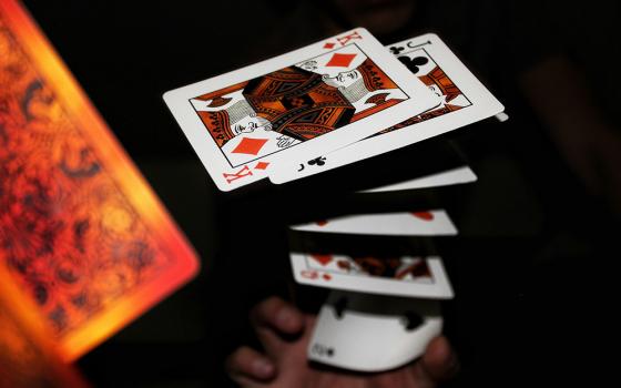 Card magic trick (Unsplash/Kenneth Berrios)