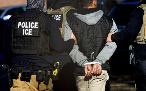 Agents with the Immigration and Customs Enforcement detain a man after conducting a raid at the Cedar Run apartment complex in Denver Feb. 5, 2025. A new study released May 1, 2025, estimated that under a mass deportation scenario, 3.8% of all U.S. citizen children, about 2.7 million, are at risk of being left with no parents in their home. (OSV News/Reuters/Kevin Mohatt)