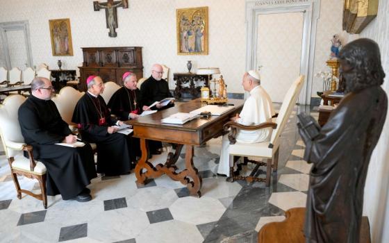 Pope Leo XIV meets with officials of the U.S. Conference of Catholic Bishops, in the library of the Apostolic Palace at the Vatican Oct. 10. From the left are: Fr. Michael Fuller, general secretary; Baltimore Archbishop William Lori, vice president; Archbishop Timothy Broglio, president; and Fr, Paul Hartmann, associate general secretary. (CNS/Vatican Media)