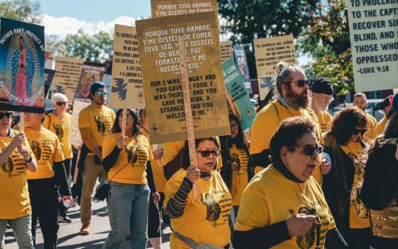 A group organized by the Coalition for Spiritual and Public Leadership marches to the U.S. Immigration and Customs Enforcement facility in Broadview, Illinois, Oct. 11. (RNS/Courtesy of Coalition for Spiritual and Public Leadership)