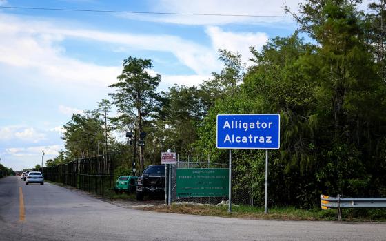 A sign is seen at the entrance of "Alligator Alcatraz" Immigration and Customs Enforcement, ICE, detention center in the Dade-Collier Training and Transition Airport in Ochopee, Florida, Aug. 3, 2025. (OSV News/Reuters/Marco Bello)