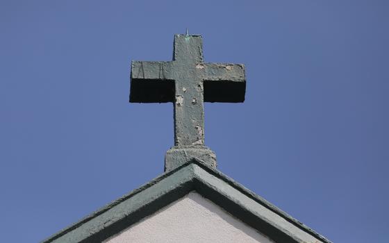 A cross is pictured atop Our Lady Star of the Sea Church in Solomons, Md., Aug. 26, 2021. (OSV News/Bob Roller)