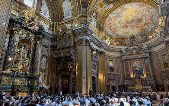 LGBTQ Catholics, their family, friends and people who minister with them attend a Jubilee Mass in Rome's Church of the Gesu Sept. 6, 2025, before walking in procession through the Holy Door of St. Peter's Basilica at the Vatican. (CNS/Courtesy of Outreach, Jack Consolie)