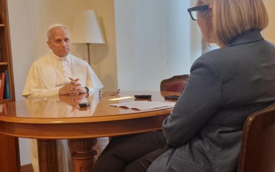 Pope Leo XIV sits with Elise Allen, senior correspondent at Crux, for an interview at the pope's residence inside the Vatican's Palazzo Sant'Uffizio July 30, 2025. The biography of the pope is titled, "Leo XIV: Citizen of the World, Missionary of the XXI Century," and it will be published in Spanish by Penguin Peru Sept. 18. English and Portuguese editions of the book will be released in early 2026. (CNS/courtesy Crux)