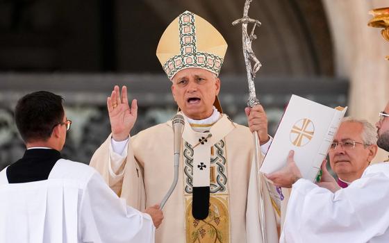 Pope Leo XIV gives his blessing at the conclusion of his Mass for the canonization of seven new saints in St. Peter's Square at the Vatican Oct. 19, 2025. (CNS/Lola Gomez)