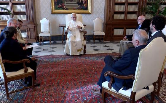 Pope Leo XIV is seen in a video clip meeting with members of the board of Ending Clergy Abuse, a coalition of survivors and human rights advocates working to end clergy abuse, enforce accountability and promote justice and truth, during an audience in the library of the Apostolic Palace at the Vatican Oct. 20, 2025. Also present is Pedro Salinas, a Peruvian journalist and abuse survivor. (CNS/screengrab from Vatican Media video)
