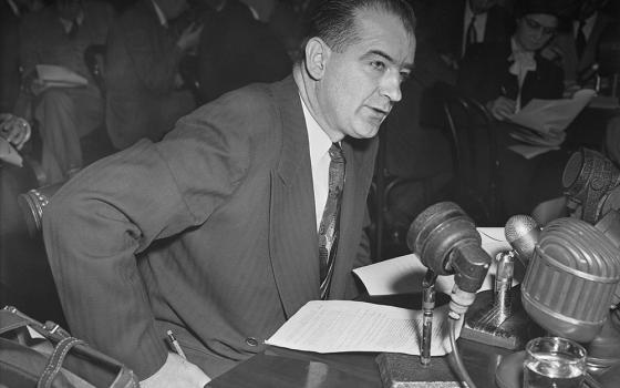 In this file photo, Sen. Joseph McCarthy, R-Wis., accuses Haldore Hanson, key State Department official, of "pro-Communist" activities dating back to 1938, during a Senate foreign relations subcommittee, March 13, 1950. Author Clay Risen explores Congress's investigation of Communism in the federal government and Hollywood in the 1950s in his book Red Scare. (AP photo/Herbert K. White, file)