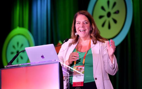 Catholic Charities USA President and CEO Kerry Alys Robinson speaks at CCUSA’s Annual Gathering in Puerto Rico this October. (Courtesy of Catholic Charities USA/Elias Kontogiannis)