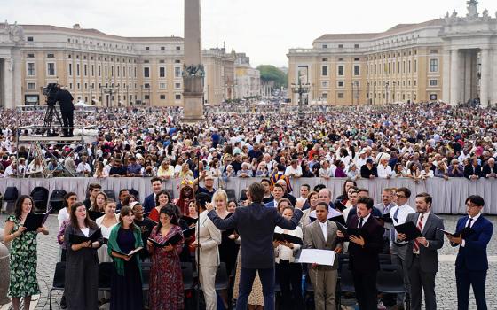 The choir of New York's Church of St. Paul the Apostle performs "Love More" below the main altar of St. Peter's Square, Sept. 24, 2025, at the Vatican. (Courtesy of Emanuele Sesta)