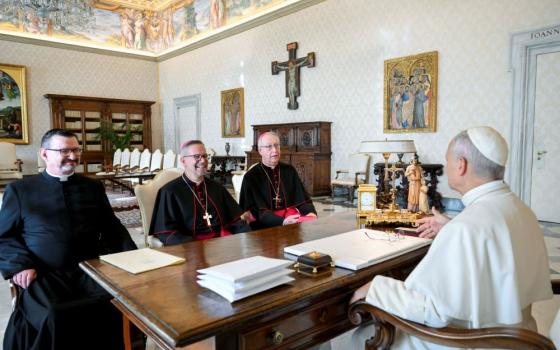Pope Leo XIV meets with leaders of the Canadian Conference of Catholic Bishops and gives the conference 62 artifacts that will be returned to Indigenous communities in Canada. With the pope, from left, are: Fr. Jean Vézina, general secretary of the conference; Bishop Pierre Goudreault of Sainte-Anne-de-la-Pocatière, Quebec, president; and Archbishop Richard Smith of Vancouver, a member of the Canadian Catholic Indigenous Council. (CNS /Vatican Media)