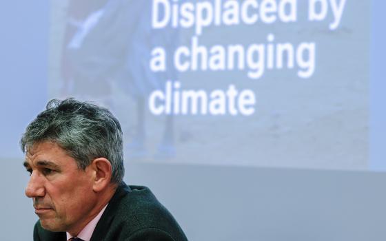Alistair Dutton, Caritas Internationalis secretary general, reflects during a press conference in Rome Oct. 26, 2023, launching the organization's report on climate change and displacement. (CNS/Lola Gomez)