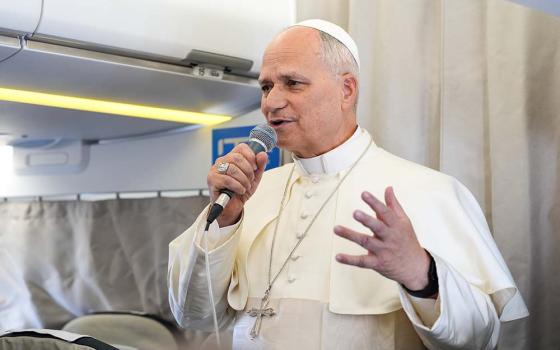Pope Leo XIV speaks to journalists during a news conference aboard his flight from Turkey to Lebanon, Nov. 30, 2025. (CNS/Lola Gomez)