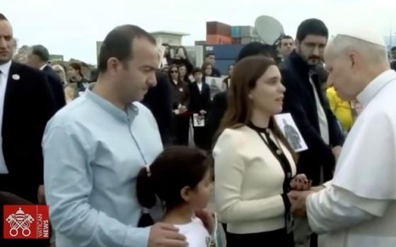 Melvine Khoury, 36, who underwent eight surgeries following the 2020 Beirut blast that killed 220 and injured scores more, speaks to Pope Leo XIV Dec. 2 during his visit to the Lebanese port to pray for victims of the explosion and their families. (OSV News screenshot/Vatican Media)