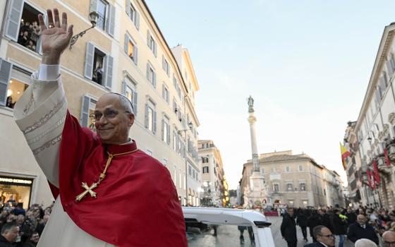 Pope Leo XIV waves from the popemobile as he arrives near the Spanish Steps in the center of Rome to lead prayers to Mary Dec. 8, 2025, the feast of the Immaculate Conception. (CNS/Vatican Media)