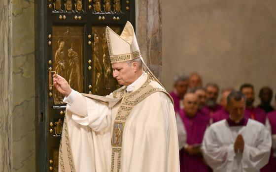 Pope Leo XIV closes the Holy Door of St. Peter’s Basilica on the feast of the Epiphany at the Vatican Jan. 6, 2026, marking the official end of the Jubilee Year 2025. (OSV News photo/Yara Nardi, pool via Reuters)