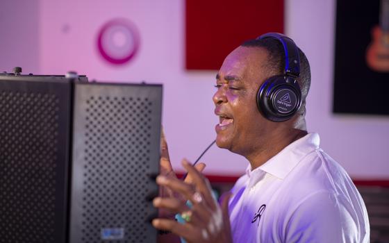 Musician and composer Jude Nnam records his song "Ndi Nna" in a studio in this undated photo. (Courtesy of Jude Nnam)