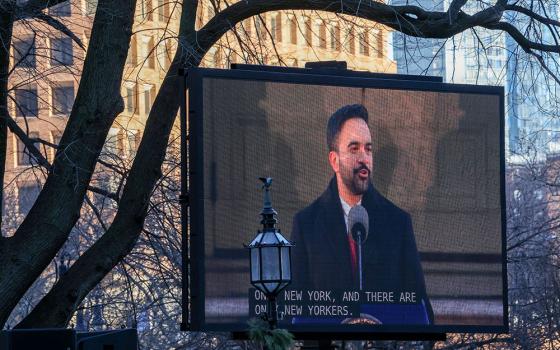Mayor Zohran Mamdani appears on a large screen during his inauguration on the steps of City Hall Jan. 1, 2026, in New York. (AP/Heather Khalifa)