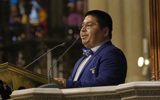 Samuel Jiménez proclaims the first reading in Spanish during the installation Mass of Archbishop Ronald Hicks as the new archbishop of New York at St. Patrick's Cathedral in New York City Feb. 6. (OSV News/Gregory A. Shemitz)