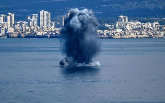 An explosion in the sea, after missiles were launched towards Israel from Iran following strikes by Israel and the U.S. on Iran, is seen from Haifa, northern Israel, Feb. 28. U.S. President Donald Trump described the attacks as part of "major combat operations" to overthrow Iran's regime in order to "defend the American people." (OSV News/Reuters/Rami Shlush)