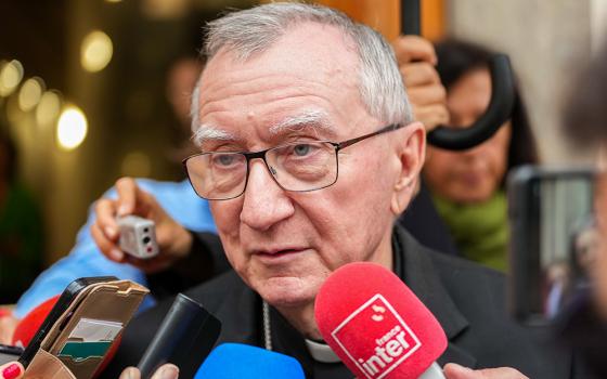 Cardinal Pietro Parolin, Vatican secretary of state, speaks with the press after the presentation of the 2025 Religious Freedom Report compiled by the papal foundation Aid to the Church in Need and released Oct. 21, 2025, during a conference at Rome's Augustinianum Patristic Institute. (CNS/Lola Gomez)