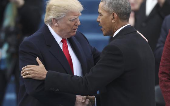 U.S. President Donald Trump greets outgoing President Barack Obama before Trump's Jan. 20, 2017, swearing-in as the country's 45th president at the U.S. Capitol in Washington. (OSV News/Reuters/Rick Wilking)