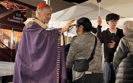 Chicago Cardinal Blase J. Cupich places ashes on the forehead of an attendee at the Ash Wednesday Mass near Our Lady of Mount Carmel Parish, Feb. 18, 2026, in Melrose Park, a Chicago suburb. (Courtesy of Coalition for Spiritual and Public Leadership/Gordon Mayer)