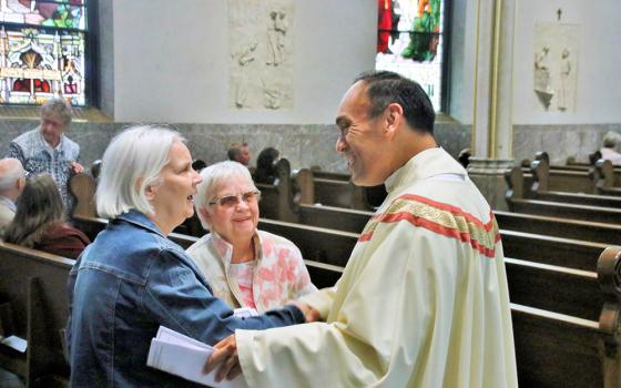 Paulist Fr. René Costanza, president of the Paulist Fathers, greets parishioners in Grand Rapids, Michigan, in 2024. (Courtesy of Paulist Fathers)