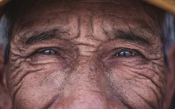 Closeup of the eyes of an old man (Unsplash/Tom Morbey)
