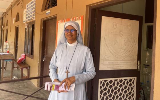 Sr. Jincy Othottil poses for a photo in front of the Chaldean Syrian Higher Secondary School in Kerala, India, where she is the manager. Othottil in 1998 dedicated herself to the lost monastic life in the Chaldean Syrian Church in Kerala. (Binu Alex) 