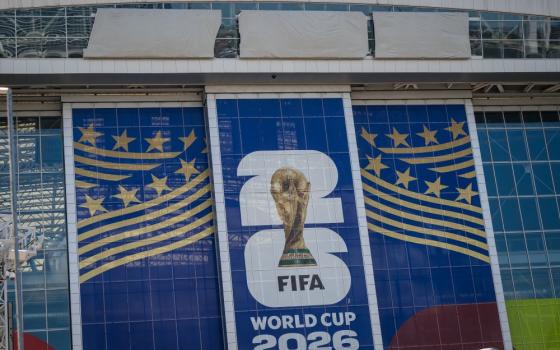 Signage on the exterior of AT&T Stadium, which will be named Dallas Stadium during the 2026 FIFA World Cup, is covered by workers as preparations continue at the venue ahead of the soccer tournament May 28, 2026, in Arlington, Texas. (AP/Jessica Tobias)
