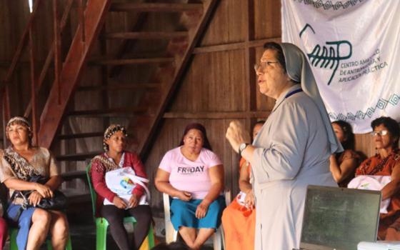 Sr. Ana María Palomino, of the Missionary Sisters of the Immaculate Virgin Mary and St. Catherine of Siena, talks to a group of women in Huánuco, Perú March 20, 2026. Palomino, is the vice president of Ecclesial Conference of the Amazon, and participated in the gathering focused on Indigenous women leaders from the Amazon. (GSR photo/Rhina Guidos) 