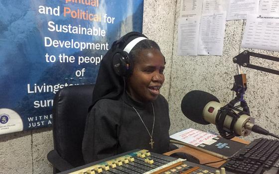 Sr. Perpetua Namasiku Mutonga, a member of the Little Sisters of St. Francis and the founder of Tumelo Catholic Media, evangelizes and shares messages of faith at Livingstone's Radio Musi-O-Tunya. (Derrick Silimina)