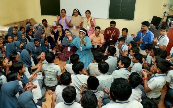 Sacred Heart Sr. Treesa Palackal, founder of Hrudayaram, a counseling center managed by the Sacred Heart Sisters at Kannur, conducts an empowerment camp on Aug. 8, 2019, for children of Puthumala, a village devastated by a landslide earlier that year. (Courtesy of Rincy Augustine)